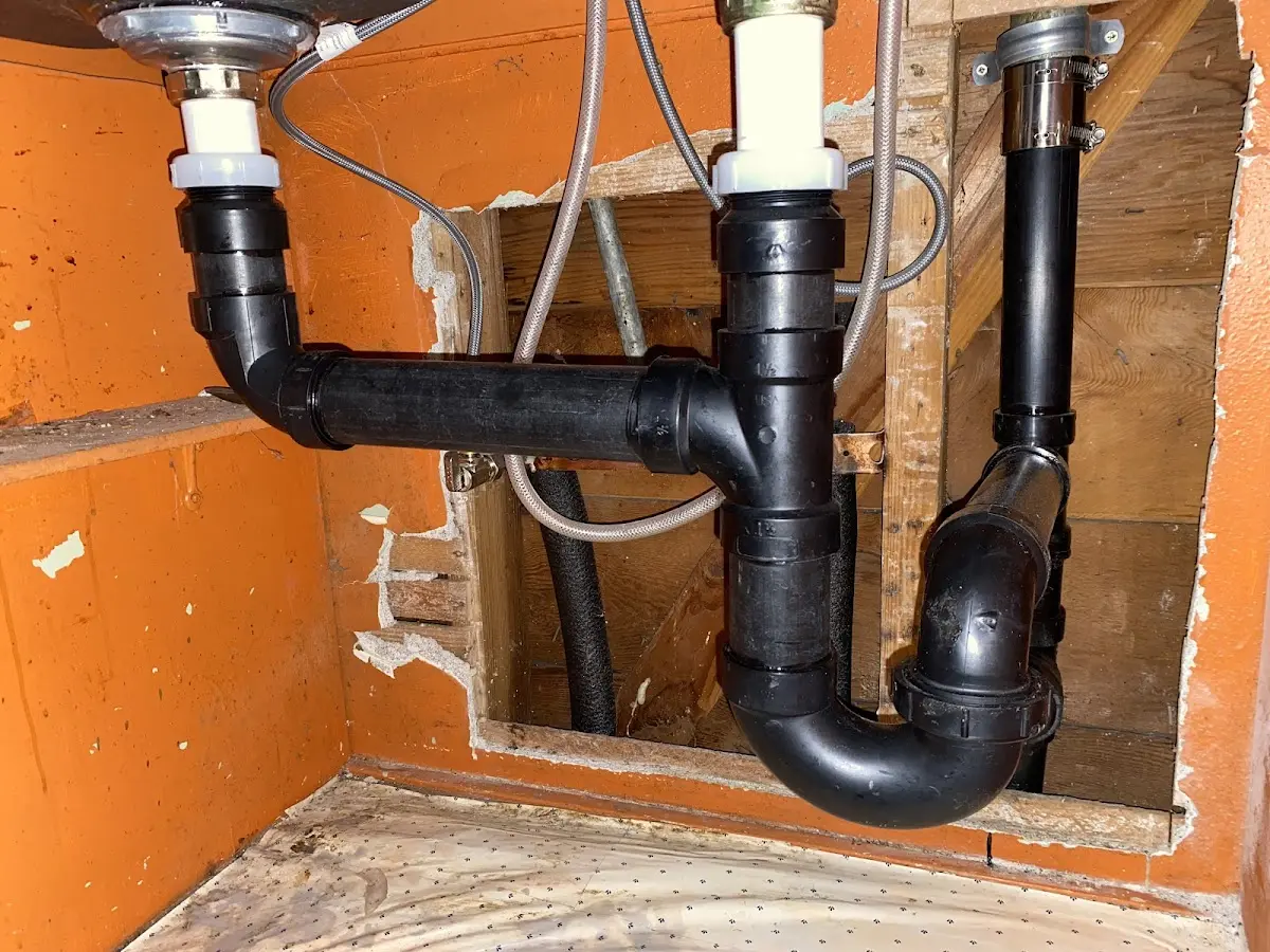 Professional Garbage Disposal Repair equipment and tools on the job in Sparta